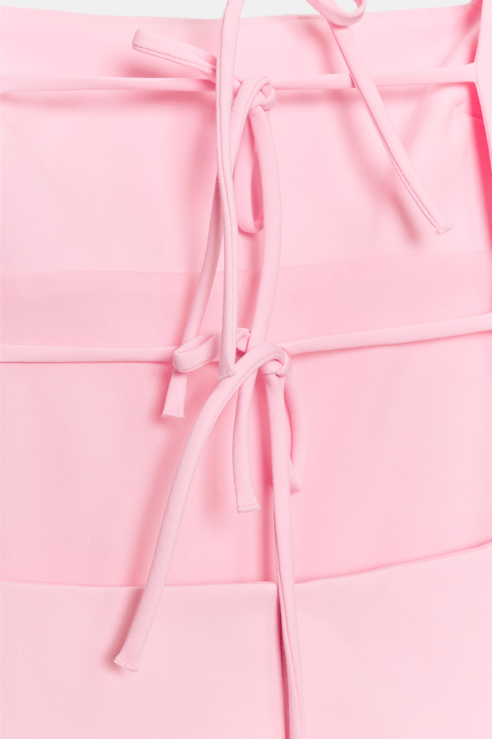 ROBE MINI À NŒUDS AU DOS ET POIS